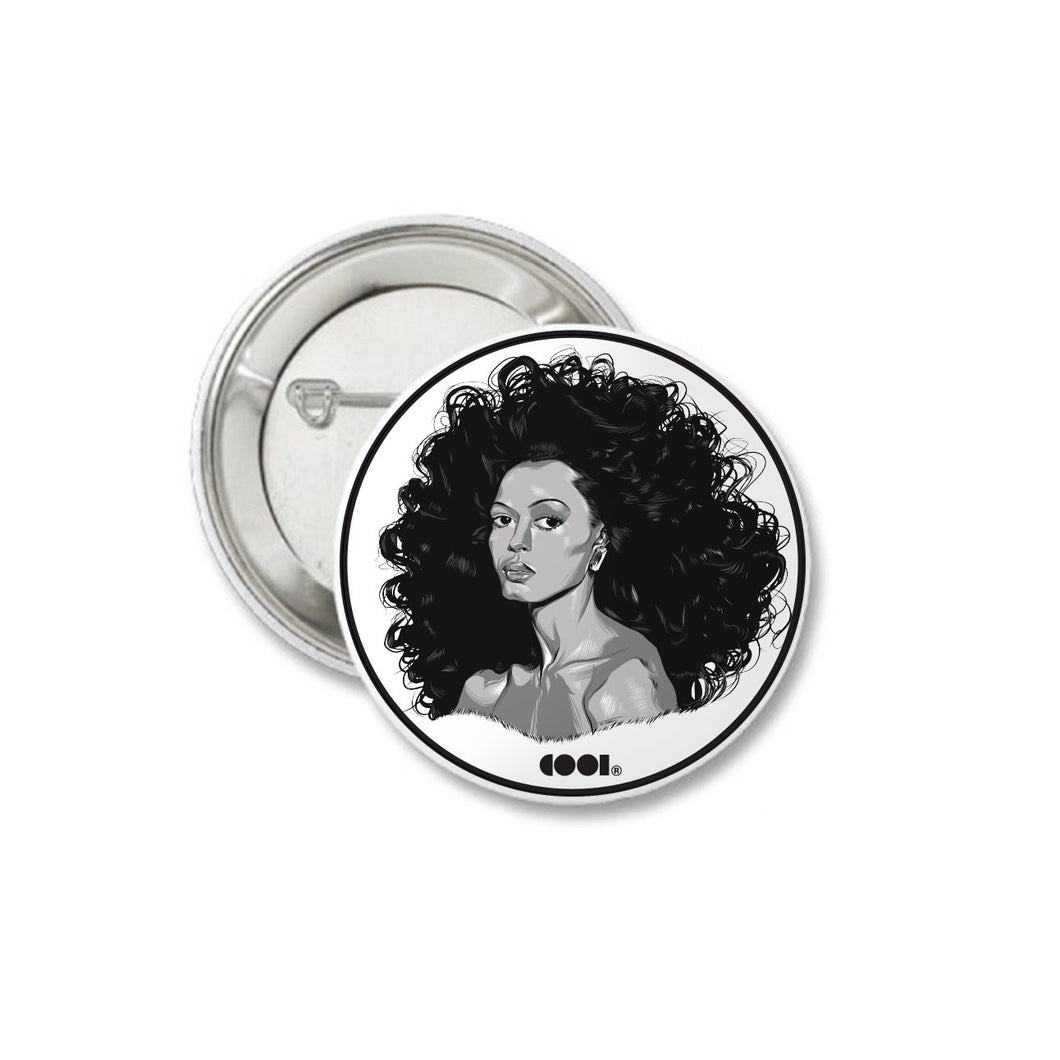 White and black matte pin back button with Diana Ross drawing on it