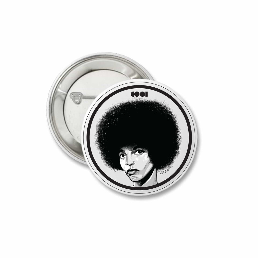 White and black matte pin back button with Angela Davis drawing on it