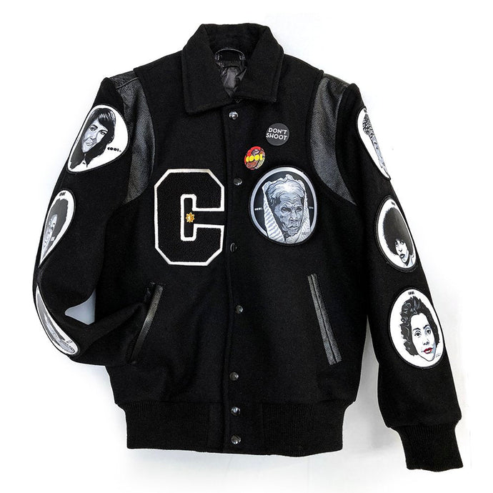 Black wool and leather varsity jacket with patches of black historical figures on them