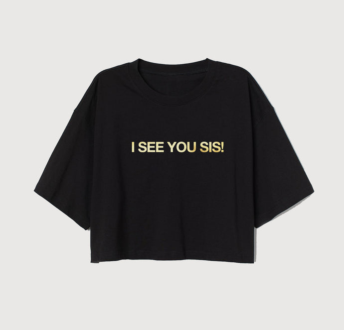black cropped shirt with gold letters on front that says I see you sis